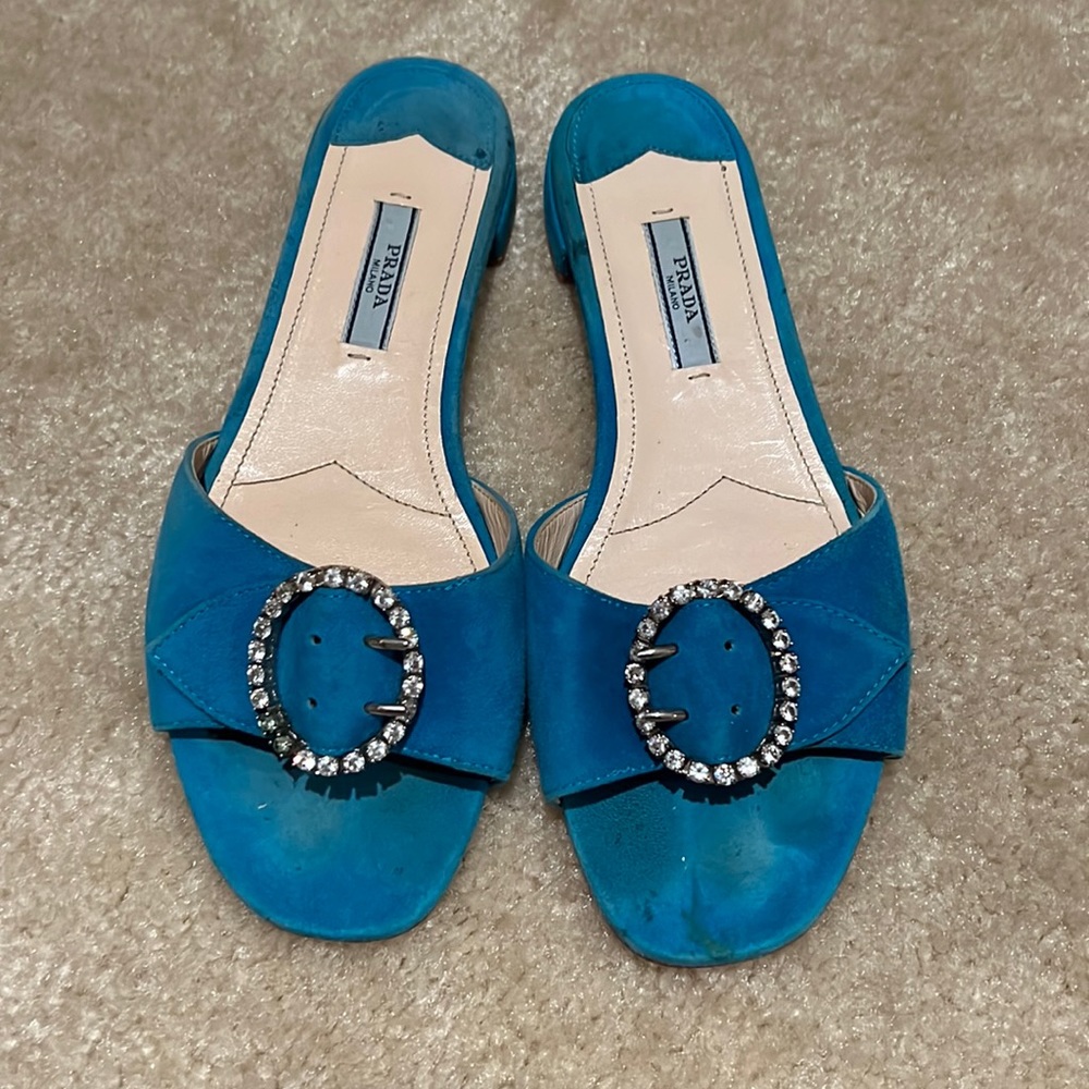 Prada teal slide ons with a crystal buckle size 37